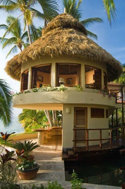 A thoughtfully designed eco-friendly home that combines natural materials, energy efficiency, passive cooling, and sustainable architecture.